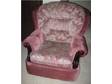 BOUYANT COMFY CHAIR,  traditional style. has wooden arm....